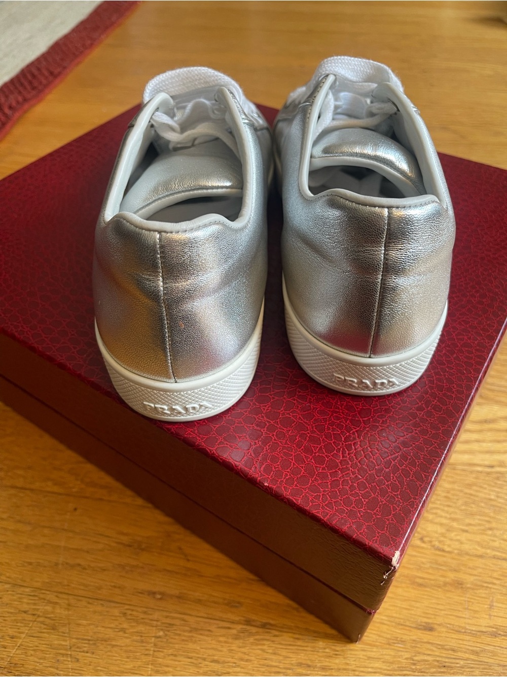 Prada | Embossed Metallic Sneakers in Silver - Picture 2 of 5